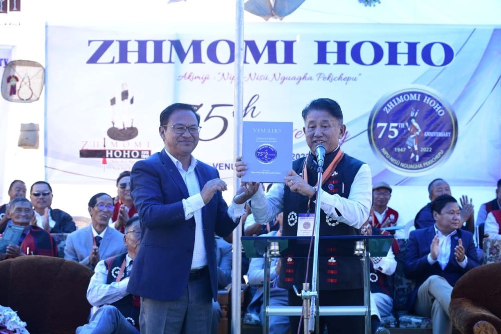 MLA Azheto Zhimomi releases a souvenir (Vesulho) during the Zhimomi Hoho 75th anniversary celebration on November 24.